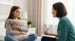 © Liew - Teen girl receiving therapy session from a professional counselor while holding a pillow for comfort