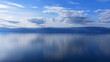 © Drones Sauvages - Aerial View 4K of Lake Leman with Cloud Reflections on Calm Water and Minimalist Landscape