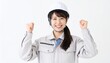 © Diamond Fuji - 作業服とヘルメット姿の若い女性が両手でガッツポーズをする現場作業員イメージ