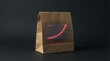 © Noer Aditia - Brown paper bag with glowing red price increase graph, symbolizing rising costs and inflation in consumer goods.