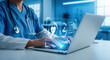 © Alisha - Doctors working on laptops with digital medical interface, health information system, telemedicine, electronic health records, medical technology, and modern healthcare innovation