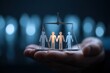 © Worrapol - Hand Holding Scales of Justice with Human Figures for Data Rights Legal Protection and Fairness