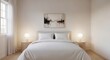 © Tiana_Geo - Modern bedroom with white bedding and bedside lamp. Minimalist interior design with abstract painting on wall. Calm domestic space for rest and sleep, cozy home lifestyle concept.