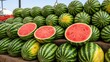 © Erlin - Fresh Watermelons Displayed at an Outdoor Market.