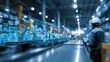 © Yothin - Industrial Warehouse Worker Inspects Digital Inventory Holograms With Tablet Device Futuristic Technology