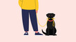 © Rubina - Person standing with their pet dog that is holding its own yellow leash in its mouth while waiting for a daily walk.