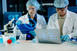 © Nuttapong punna - Medical team using AI and digital tools in laboratory research, analyzing data, DNA, and diagnostics to advance healthcare innovation