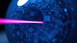 © antishock - Futuristic eye scan. Blue circuitry patterns visible. Pink laser beam crosses pupil. Digital interface, technology concept.
