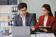 © ARMMY PICCA - Group of business people and software developers working as a team in office
