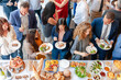 © Rawpixel.com - Vibrant social gathering with food