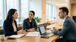 © Cealv - Diverse business professionals collaborating and discussing teamwork in a modern office meeting room.