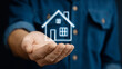 © Kingdola - Dream Home Handheld: A symbolic presentation of homeownership, showcasing a person's hand tenderly holding a digital representation of a house.