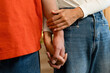 © MIND AND I - Close-Up of Loving Couple Holding Hands in Affectionate Gesture