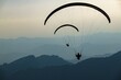 © Robert Seitz/imageBROKER - Paragliders over the Appenzeller Land, Wasserauen, Appenzell, Switzerland