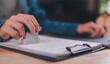 © Images for you - A corporate lawyer uses a legal stamp to approve contract authorization, ensuring document verification, compliance approval, business agreement validation, corporate governance, regulatory process