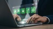 © No Banned - Businessperson using a laptop with ESG and eco-friendly icons representing sustainable and green energy concepts