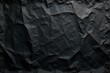 © prachaya - Aged black paper, deep creases, distressed texture, grunge background, dark, light