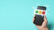 © Erika - Hand holding smartphone displaying floating feedback icons with happy neutral sad emojis and rating stars on blue background for customer service review concept