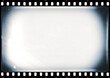 © andras_csontos - 35mm photo film strip with white dusts and scratches and strong lens vignetting, A4 aspect ratio page template with transparent background (PNG image)