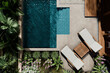 © hitdelight - Aerial view of luxury swimming pool design and garden landscaping. Modern beach house architecture with tropical palms. Top view. Private hotel villa resort rental concept. 3d render