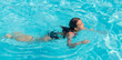 © yanadjan - kid girl swimming in pool. selective focus.