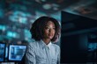 © Iryna - Woman it specialist observing system displays in control center