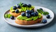 © Lisa - healthy avocado toast with mint and blueberries on a plate