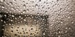 © Marta B - The Raindrops on a Window with Blurred Cityscape Background and Moody Light