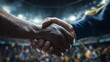 © Cleverson - Two athletes shaking hands in a stadium with a crowd in the background
