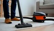 © PakistanGaming - male using dust removal with modern vacuum cleaner. Construction cleaning service, created with generative ai