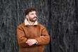 © Oscar - Young man posing outdoors in stylish winter jacket