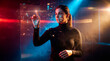 © Rendara Studio - Technology consultant woman interacting with digital interface in futuristic data environment
