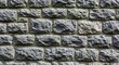 © Dion - Detailed Close-Up of Weathered Stone Brick Wall Texture Background.