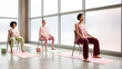 © Sebastian - Inclusive Yoga Class in Bright Studio with Three Women
