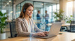 © Monktwins - Customer support agent using AI chatbot on laptop in modern office, digital service and business automation concept.