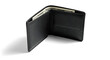 © IPX - Premium black wallet with cash partially visible isolated concept