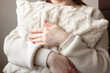 © Svetlana - Woman relaxing at home with book and blanket. Cozy lifestyle, rest and self care concept. Warm soft light and calm atmosphere.