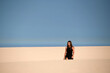 © ADDICTIVE STOCK - Woman walking on dune in Corralejo, Fuerteventura