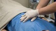© Katawut - Professional Hand Placement Techniques for Spinal Decompression Therapy and Patient Comfort