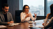 © Muhammad - Professional business woman leading corporate meeting, female executive speaking in boardroom, diverse team collaborating in modern office