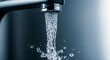 © Image - A stream of water flows from a faucet against a dark background