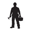 © Sharif - Silhouette of a male construction worker wearing a hard hat holding a hammer and a toolbox
