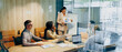 © Kostiantyn - Team engaging in creative activity using whiteboard and sticky notes