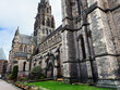 © AS Photo Family - Historic gothic St Mary's Episcopal Cathedral exterior in Edinburgh, Scotland, UK with stone architecture, tall spire and arched windows in a dramatic urban setting