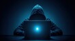 © Stocker Man - Anonymous hacker in black hoodie using laptop in dark room, cyber crime and data breach concept, mysterious hooded man with glowing computer screen