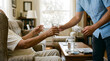 © solom - young man helping senior person during summer heat wave by providing a glass of cold water and a portable electric fan for cooling and comfort in a bright living room setting