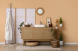 © Pixel-Shot - Interior of bathroom with folding screen, sink and plants