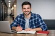 © VideoFlow - Smiling student man writing at desk in modern interior. Ai generative