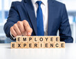 © magele-picture - Employee Experience - Geschäftsmann zeigt auf den Text 'Employee Experience'