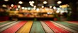 © Khawla - Vibrant Striped Wooden Table with Festive Bokeh Background. Image of wooden table in front and abstract blurred bright cinco de mayo background